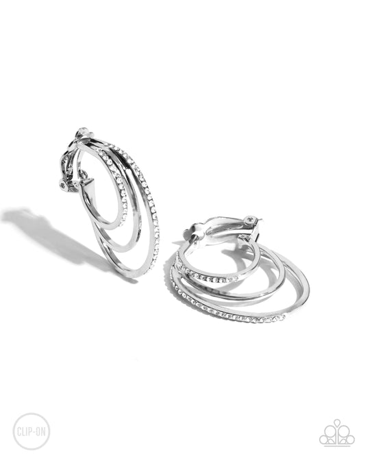 Triad Trek White Clip-On Earrings Paparazzi