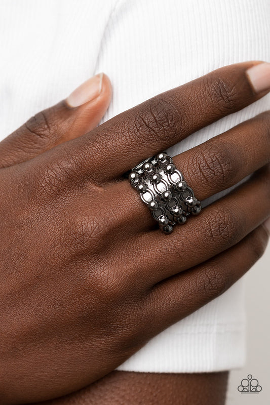 Dauntless Demeanor Black Ring Paparazzi